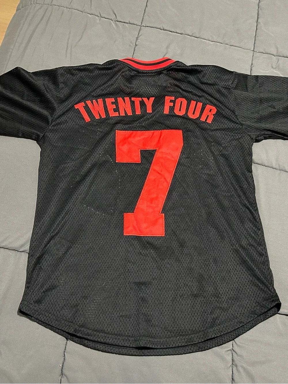 Million Dolla Motive Black & Red Mesh Sports Jersey. Size Medium